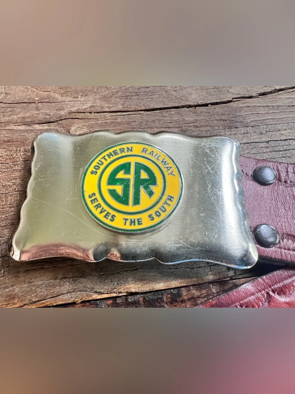 Men’s leather belt with “Southern Railway Serves the South” belt buckle.